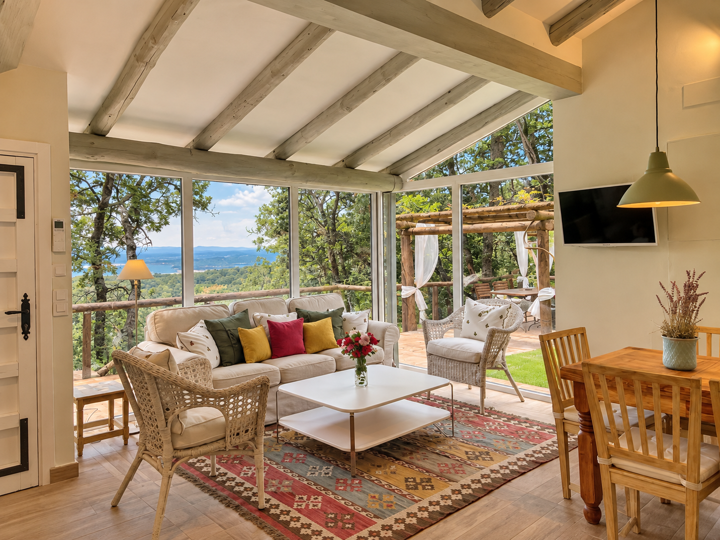 Glazed living and dining room at Villa Los Fresnos