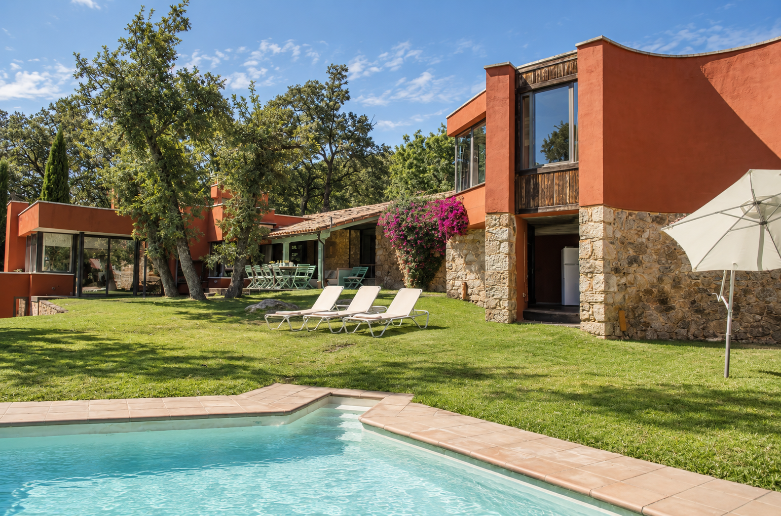 Villa Candelaria's pool with the house in the background