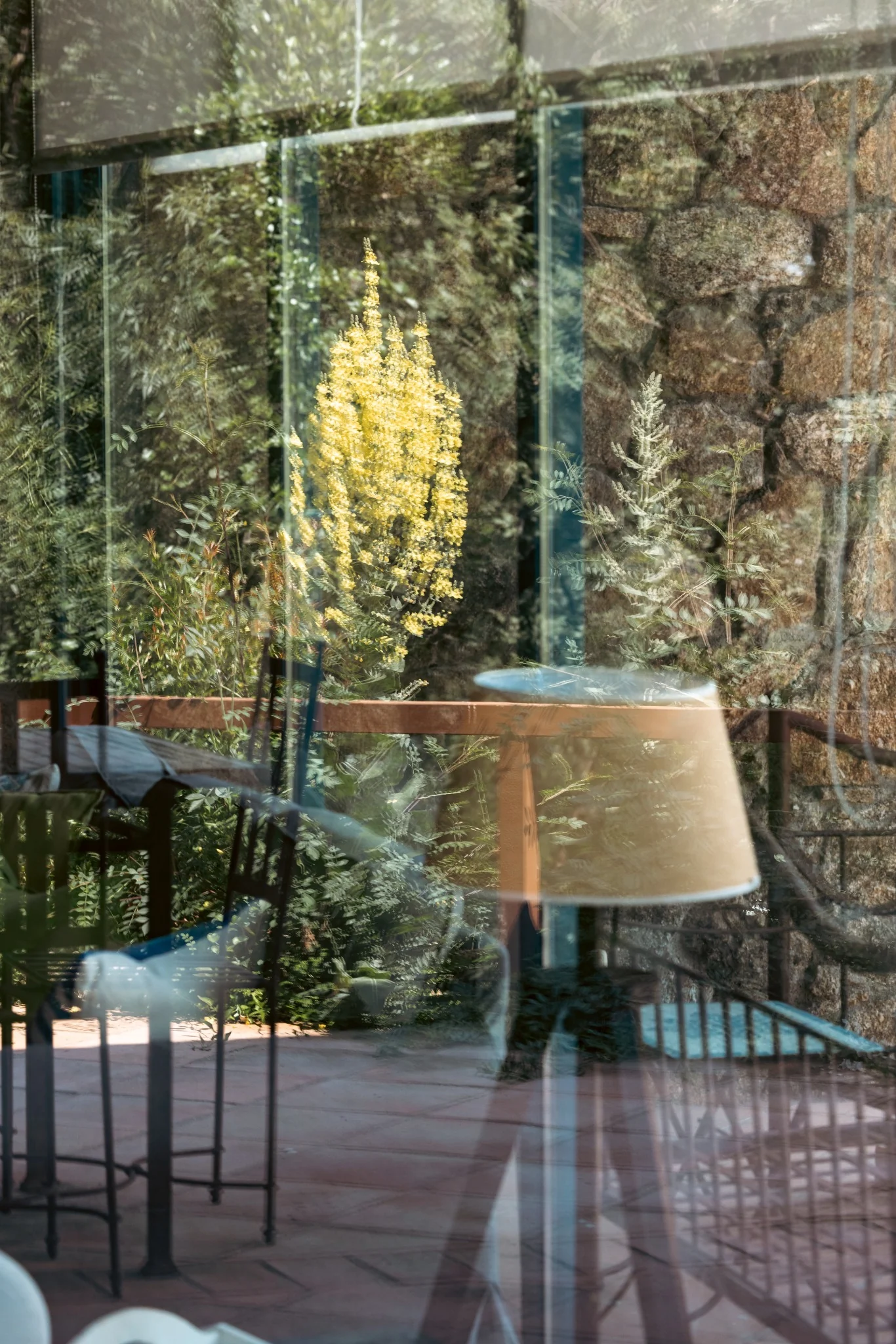 Detail of the glazed living room at Villa El Arroyo