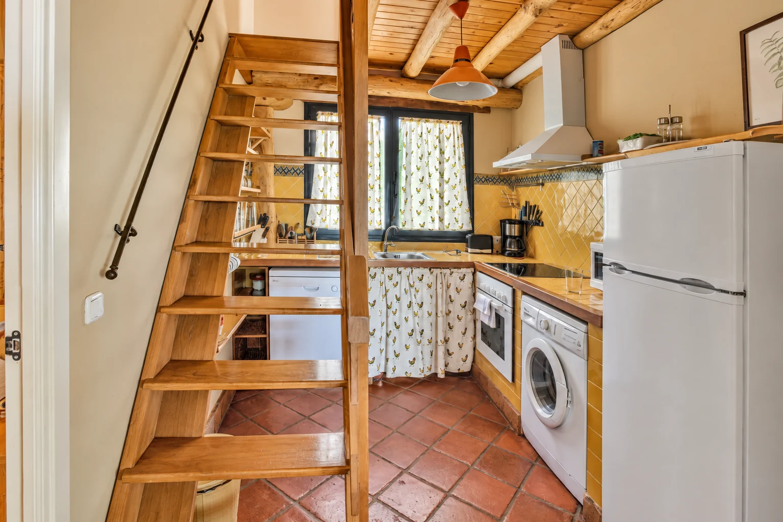 Kitchen at Villa Los Olivos beside the staircase