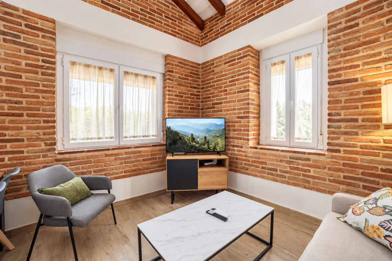 Bright living room of Romero Apartment with a light sofa