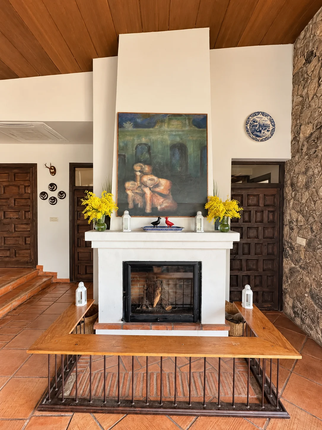 Fireplace in the living room at Villa El Arroyo