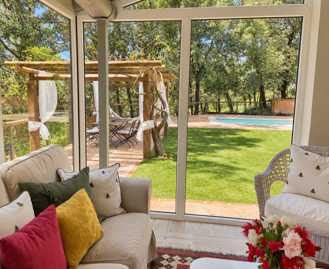 Living room opening onto the garden at Villa Los Fresnos