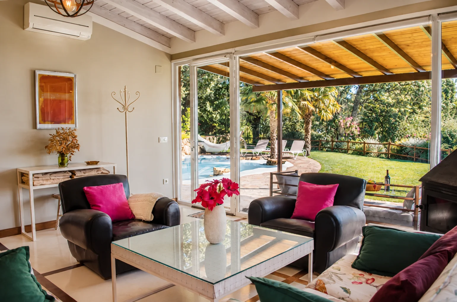 Living room at Villa Los Castaños opening onto the porch