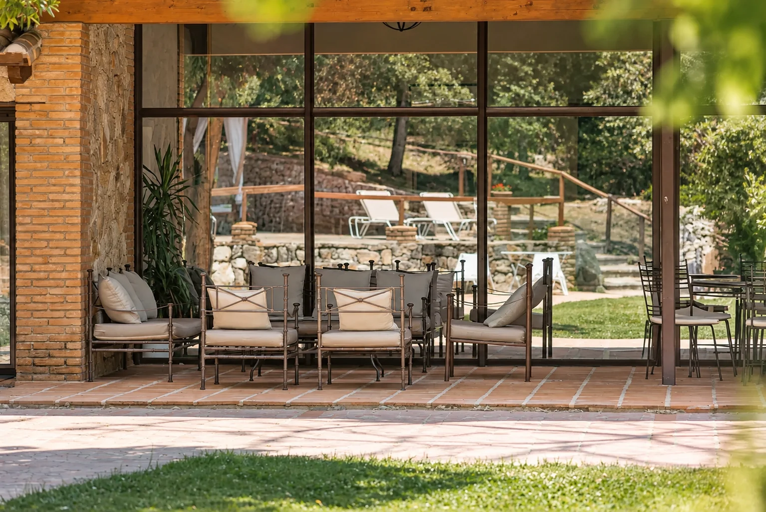 Glazed gallery at Villa El Bosque opening outdoors