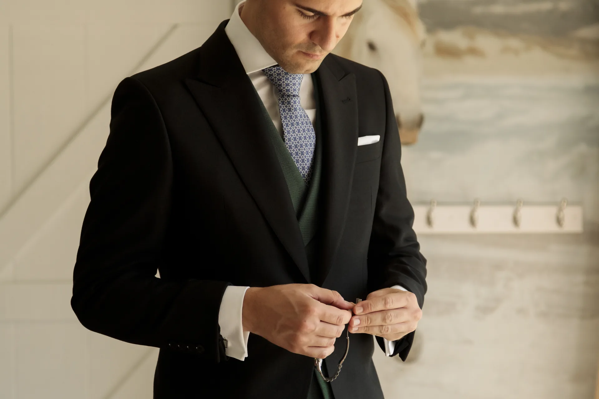 The groom getting ready before the ceremony