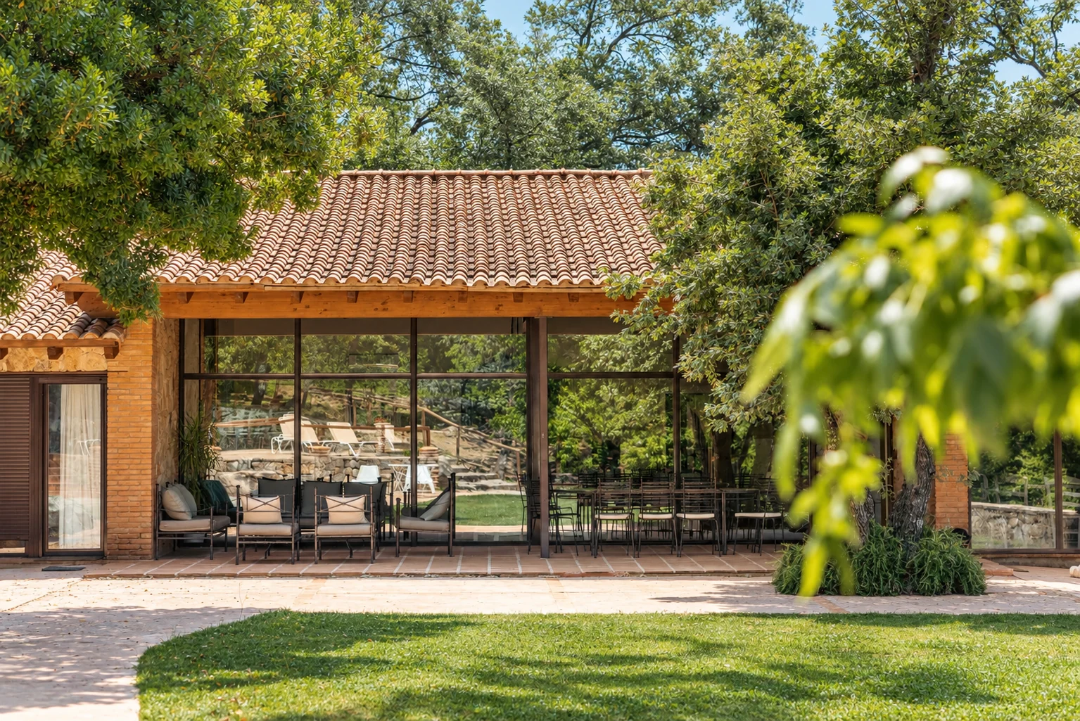 Facade of Villa El Bosque opening onto the garden