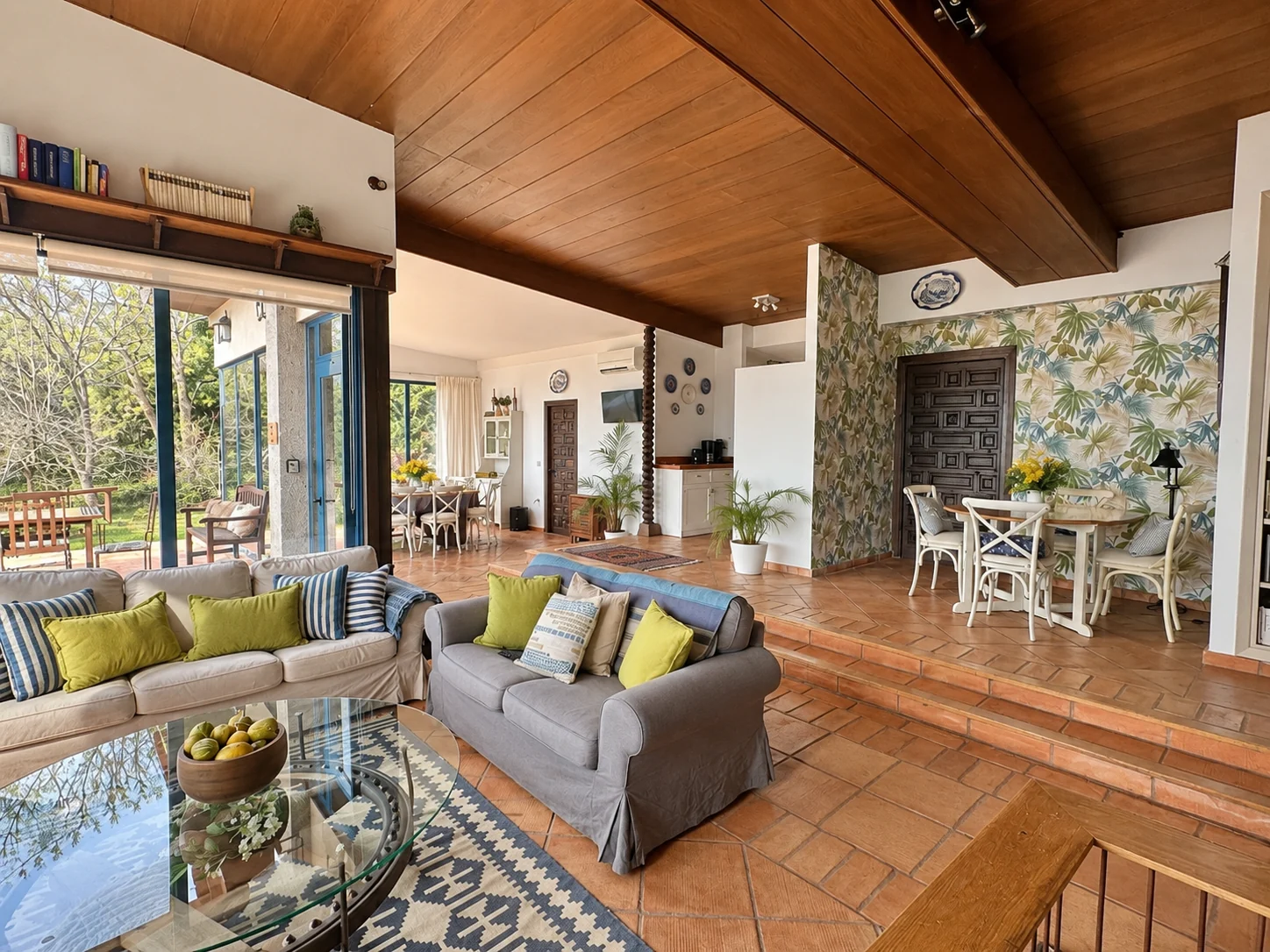 Living room at Villa El Arroyo opening onto the garden