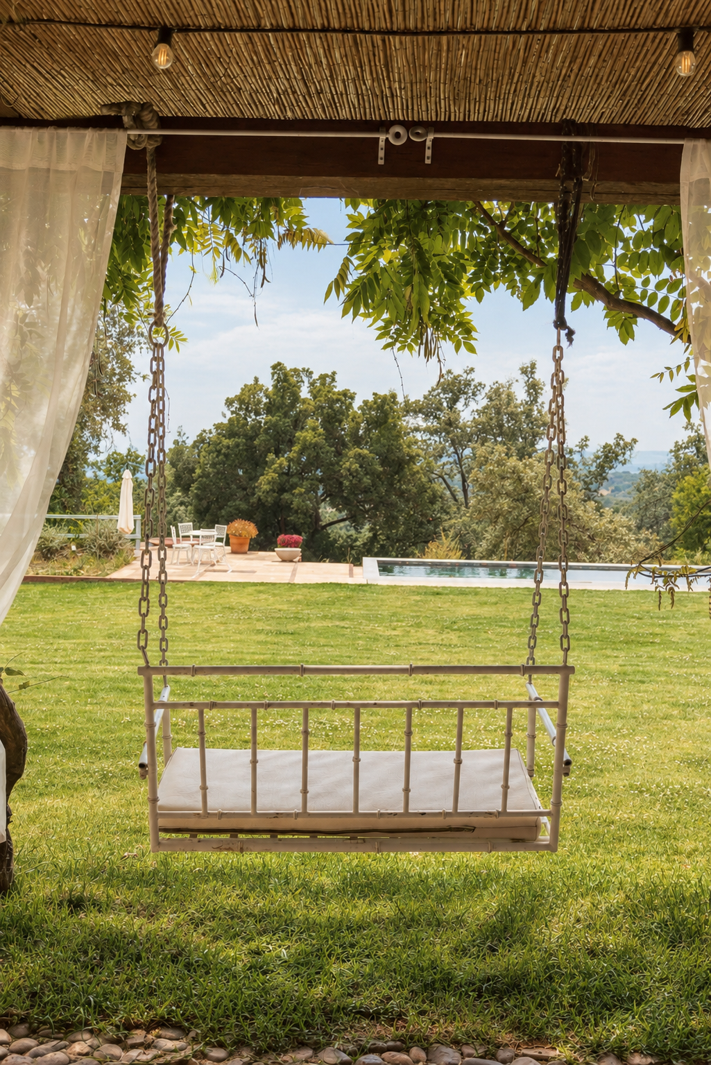 Swing beneath the porch at Villa Las Cuadras