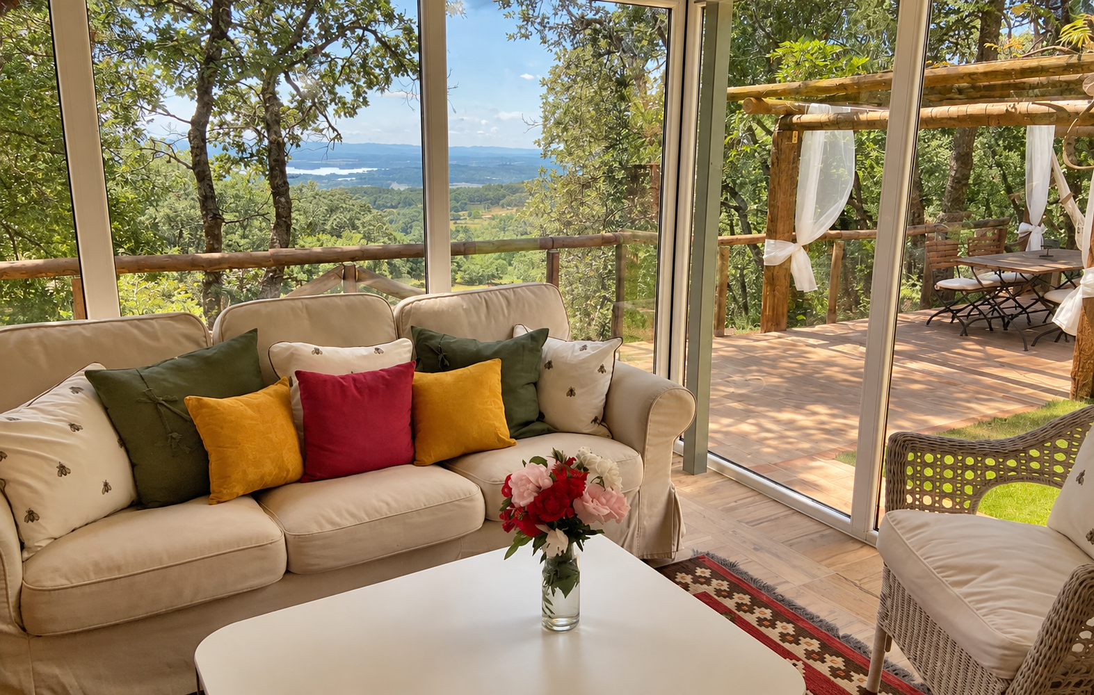 Glazed living room at Villa Los Fresnos open to the garden