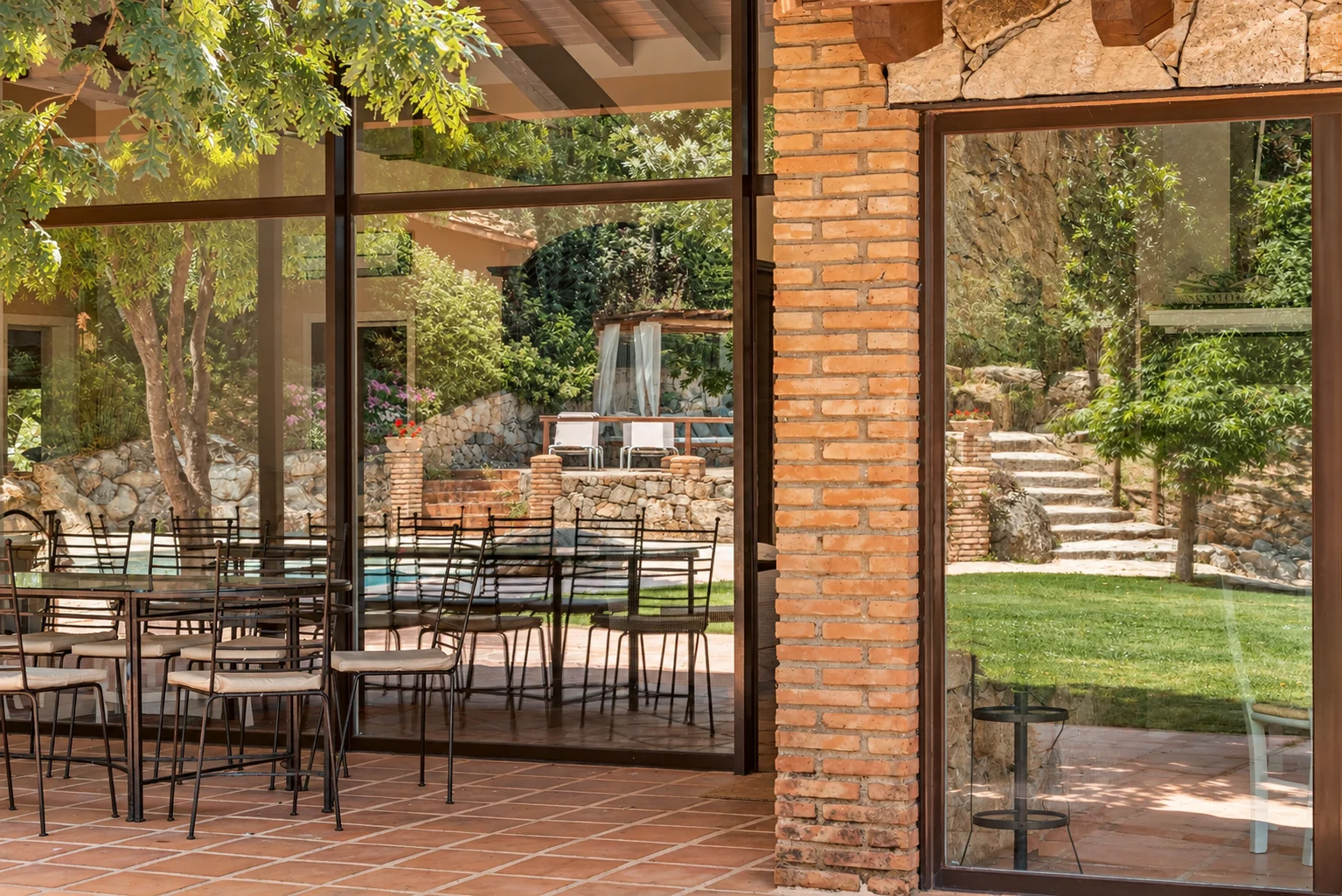 Covered porch at Villa El Bosque beside the garden