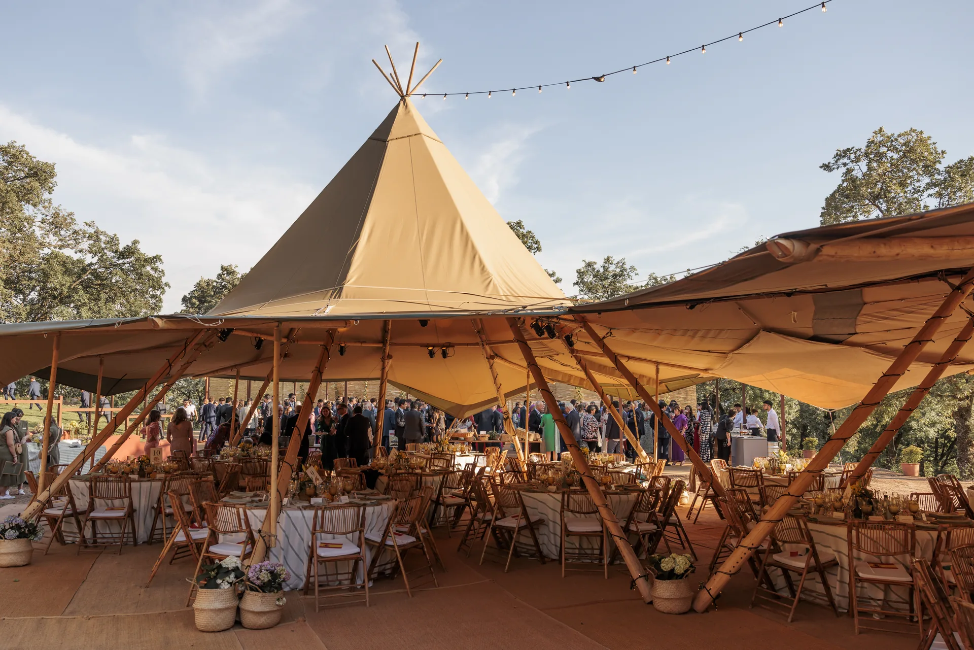 Full view of the tables and marquees set up for the celebration