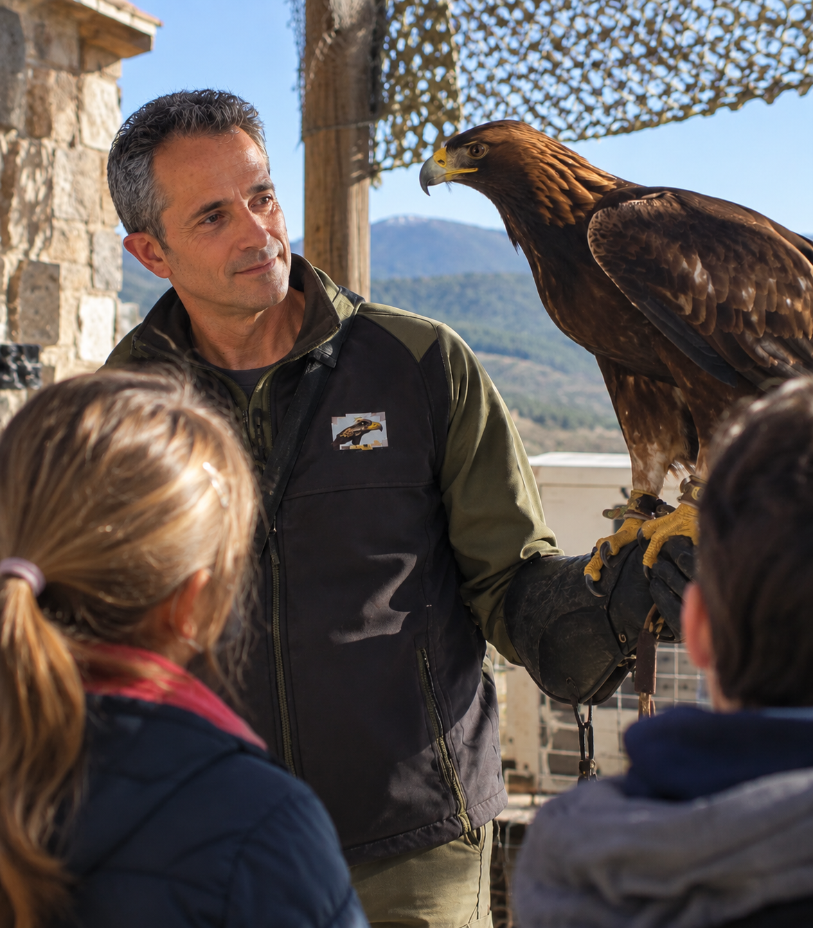 Ecotourism guide showing an eagle up close during the Eagle Experience