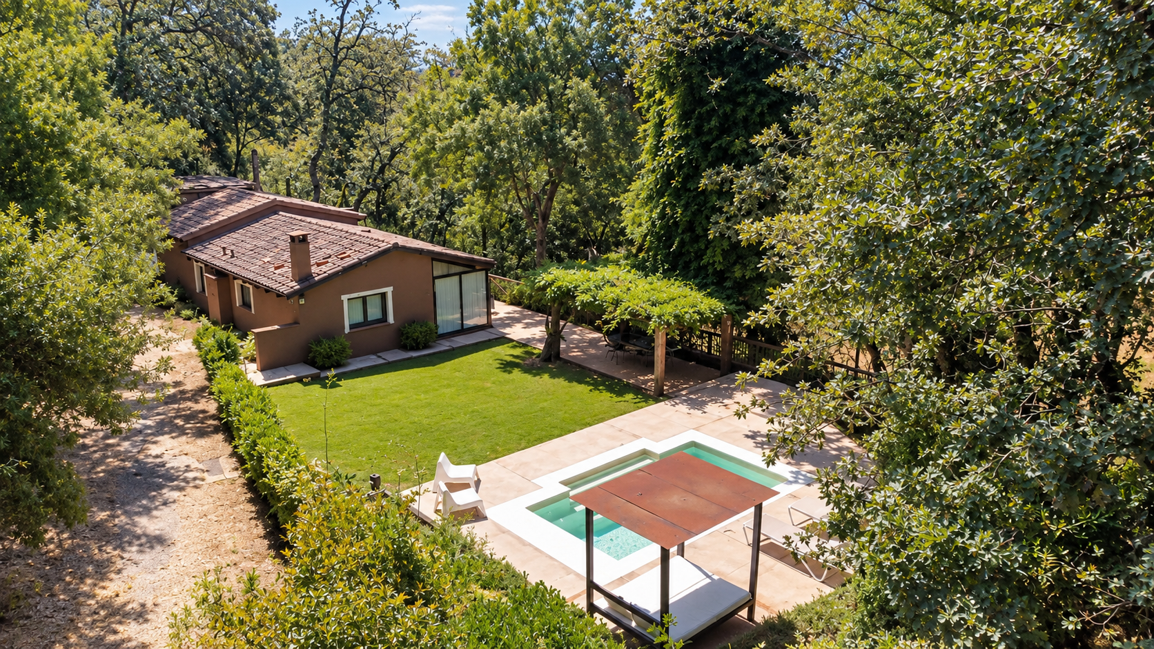Aerial view of Villa Los Fresnos with pool and garden