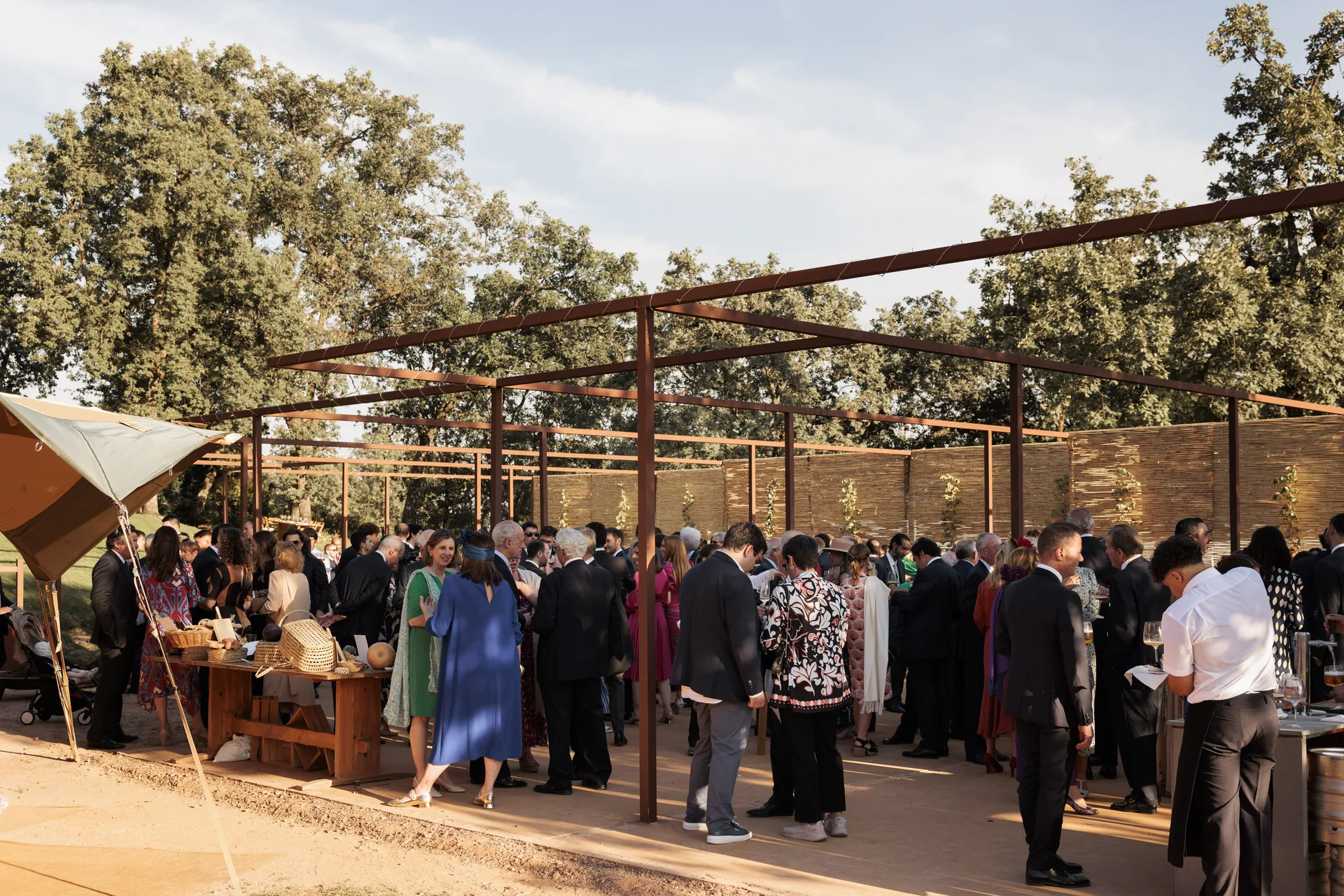 Guests gathered in the outdoor space during the ceremony
