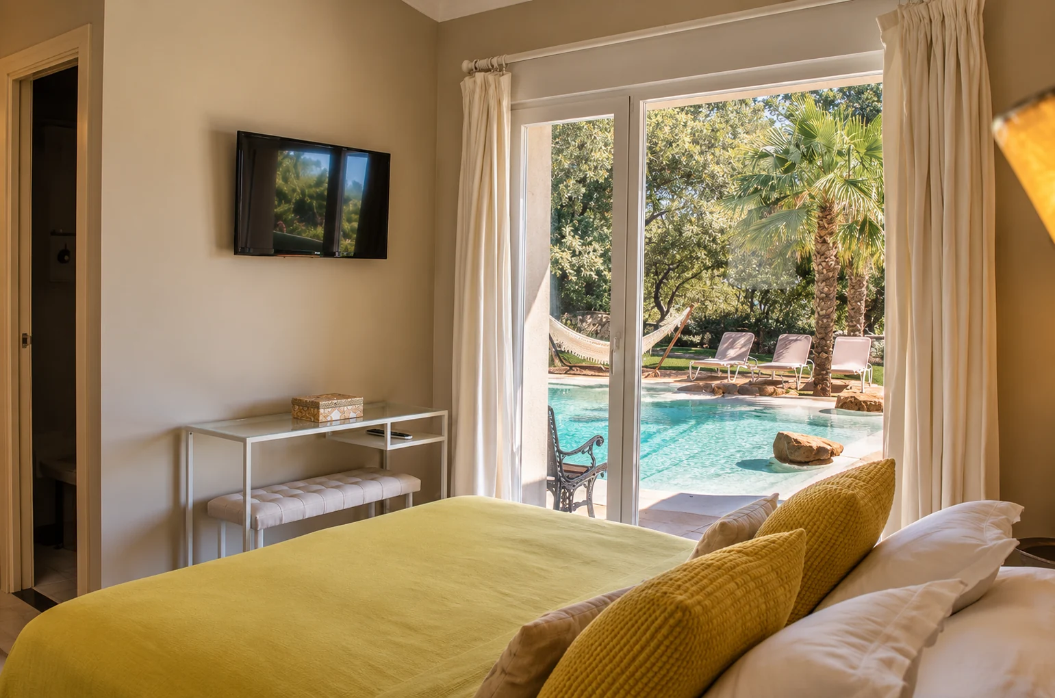 Bedroom at Villa Los Castaños overlooking the pool