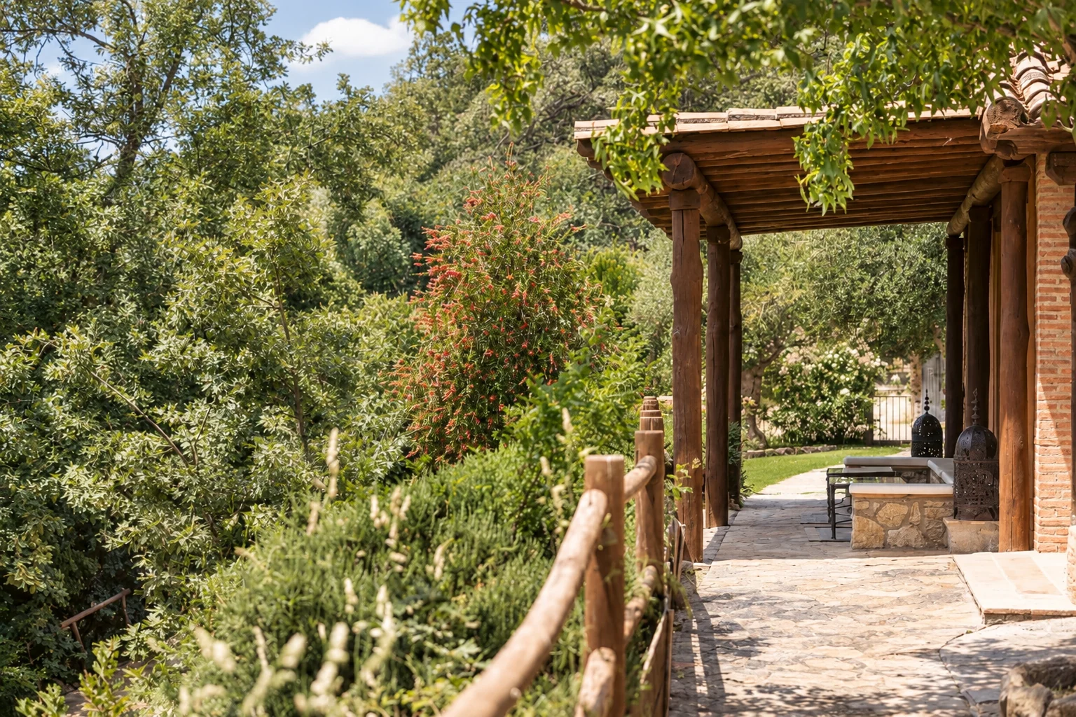 Side porch at Villa Los Olivos opening onto the woodland