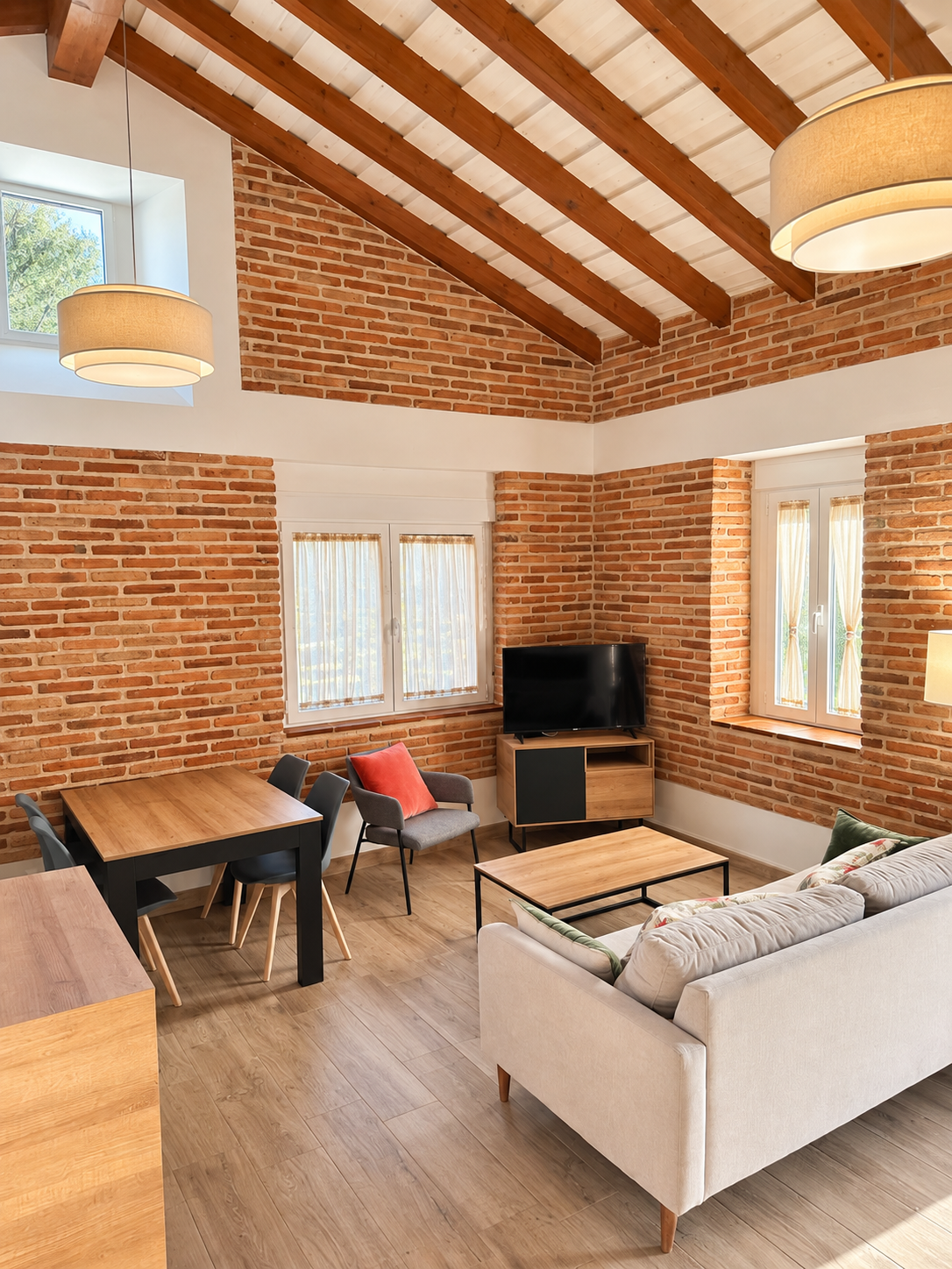 Living room of the Romero apartment, in the Chilla area, with wooden beams