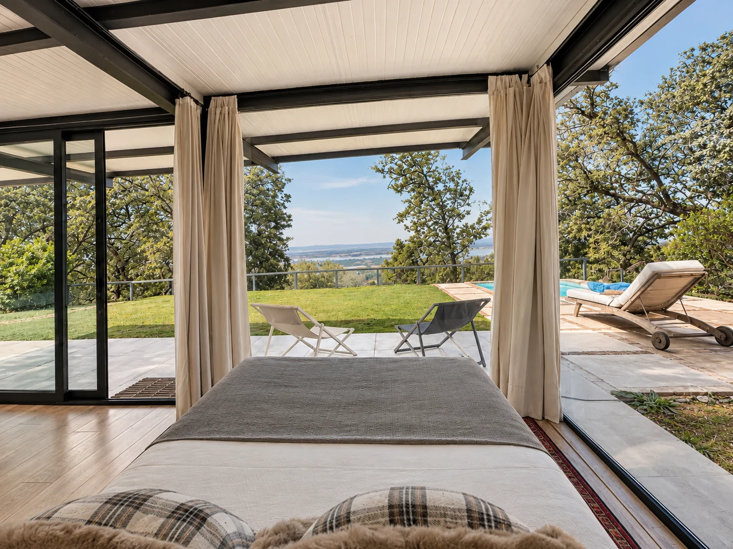 Bedroom at Villa La Palmera opening onto the terrace