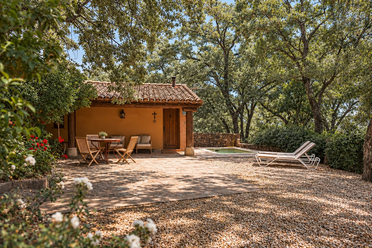 Villa Los Rosales and its garden among holm oaks
