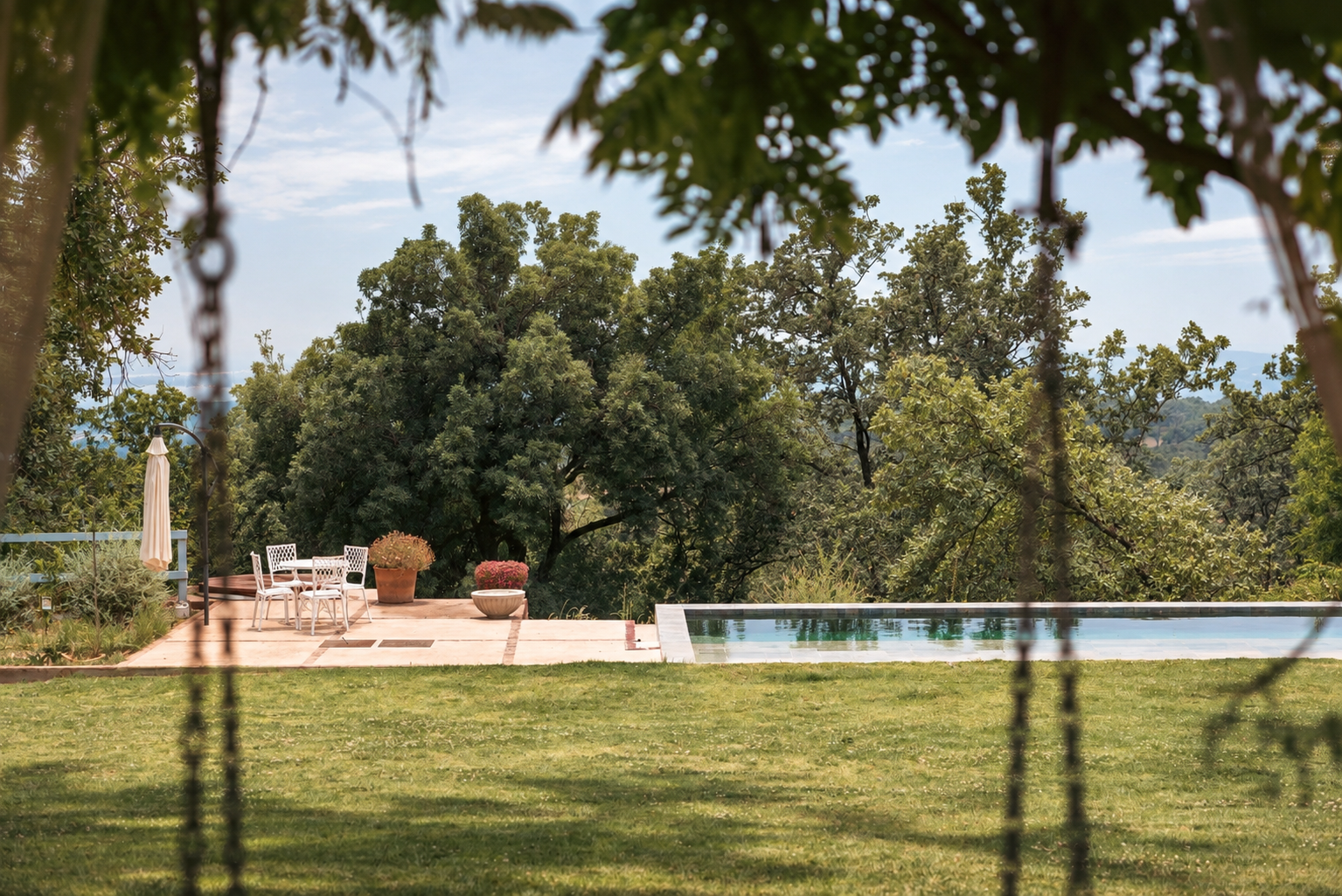 View of the garden and pool at Villa Las Cuadras