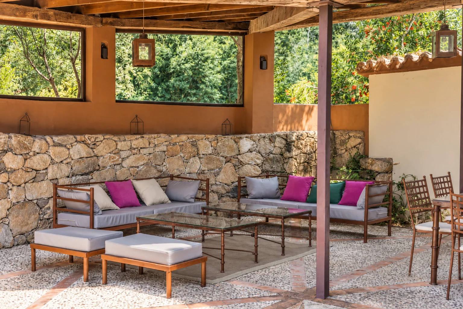 Stone porch at Villa Los Castaños with outdoor seating