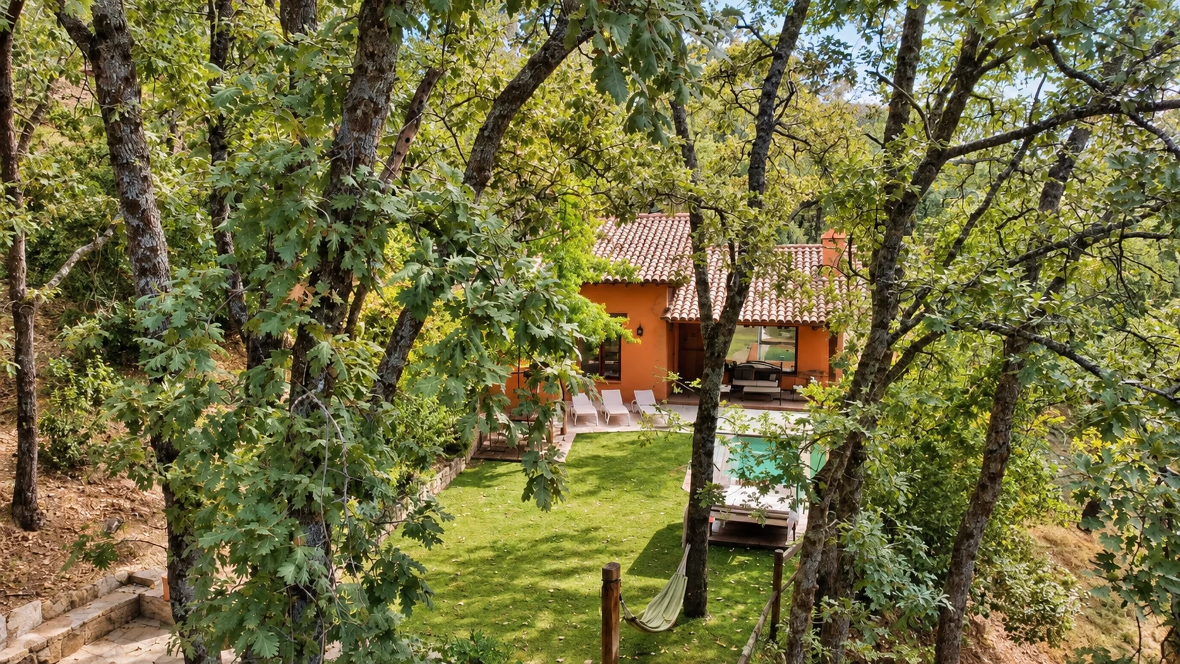 Elevated view of Villa Los Madroños and its pool