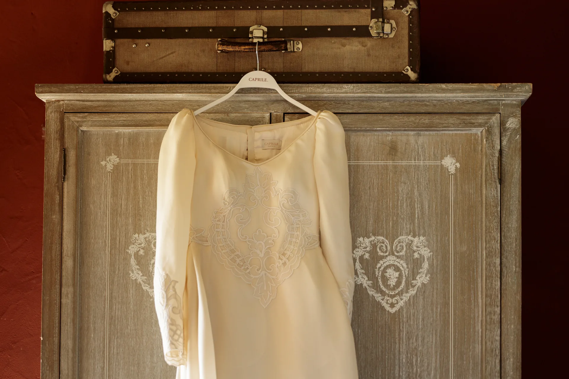 Wedding dress hanging in a room on the estate