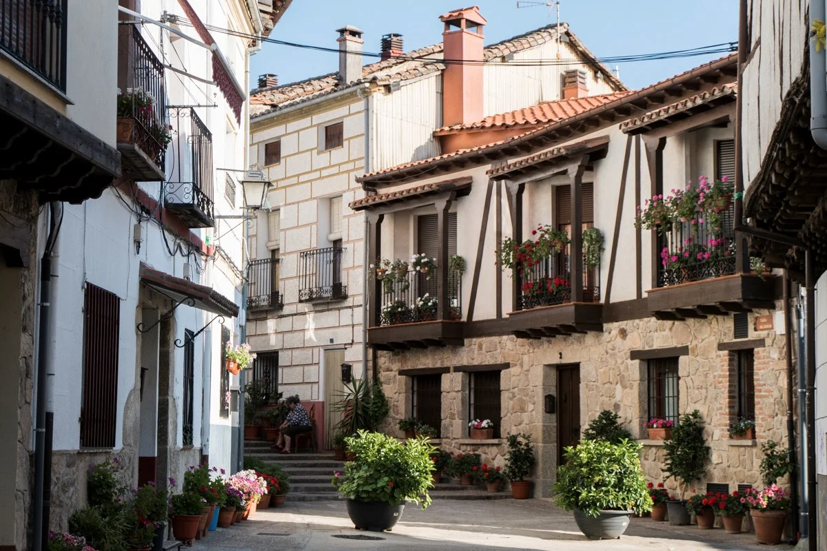 Traditional architecture and flower-filled balconies in Candeleda