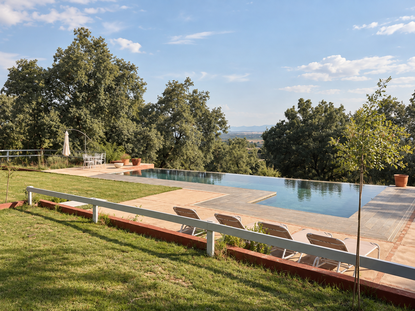 Pool and wooded landscape at Villa Las Cuadras
