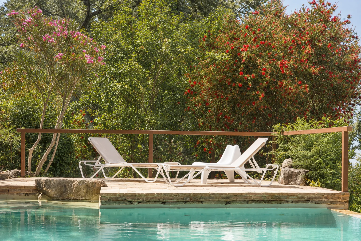 Pool at Villa El Arroyo among holm oaks