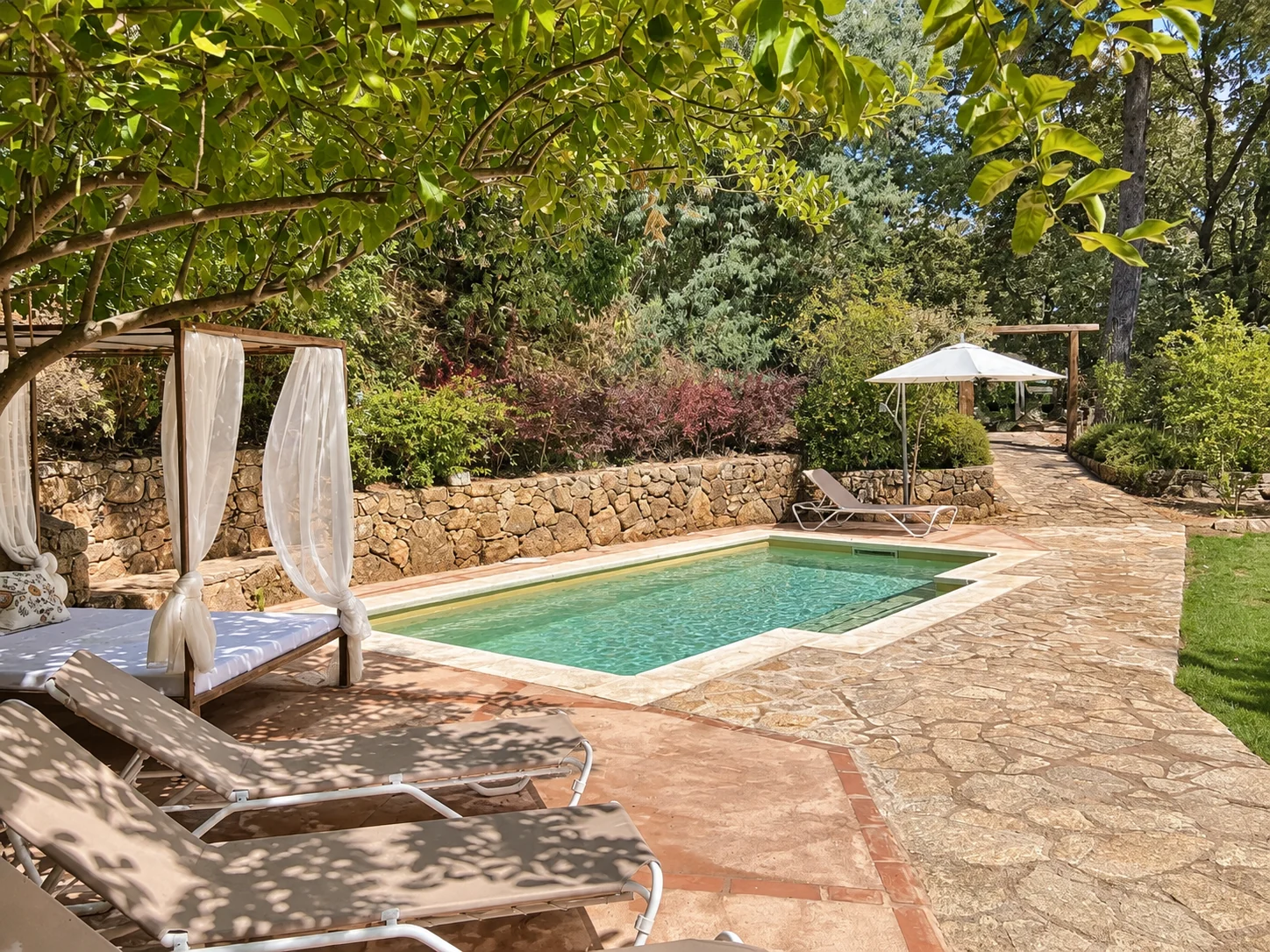 Pool at Villa Los Naranjos with a Balinese bed