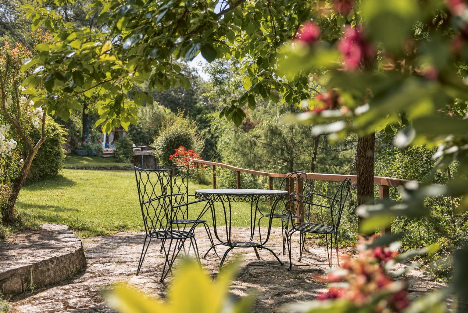 Table among flowers in the garden at Villa El Arroyo