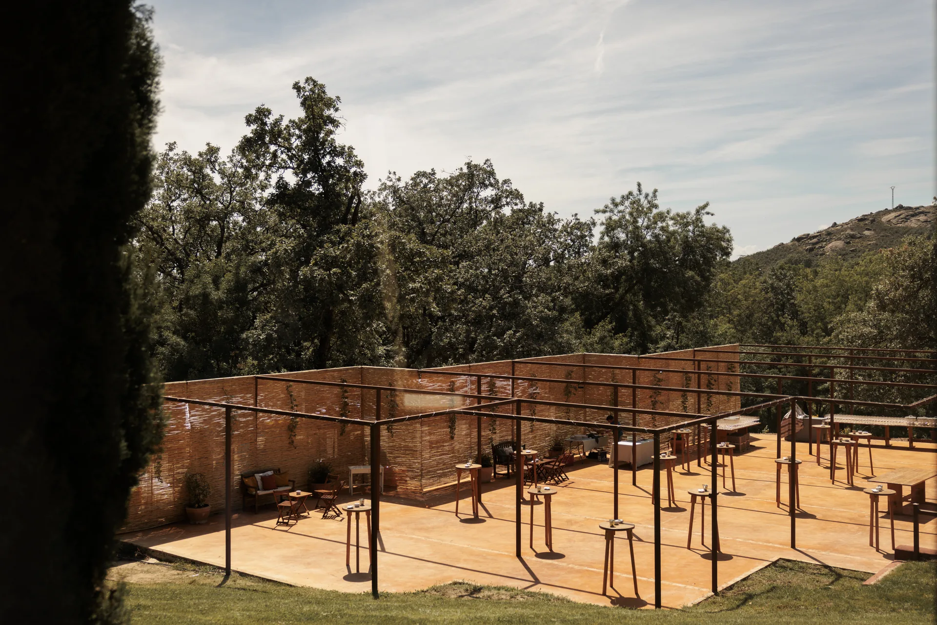 The celebration structure set up on the clearing among holm oaks