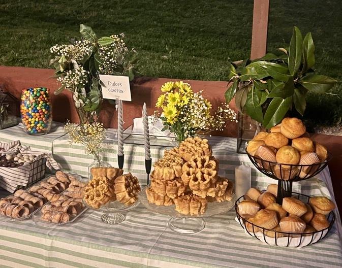 Table of pastries and breads from a catering service on the estate