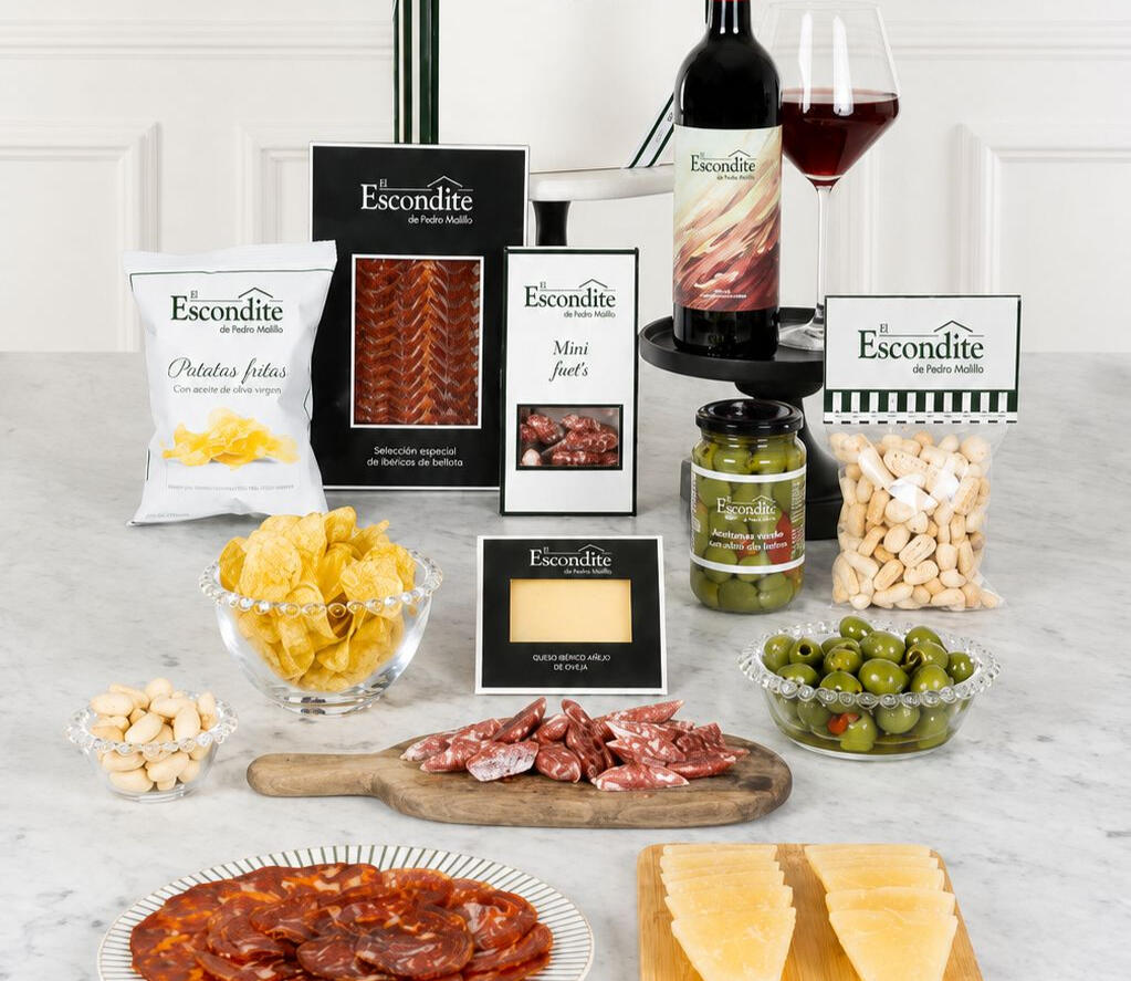 Selection of gourmet appetisers on a wooden table
